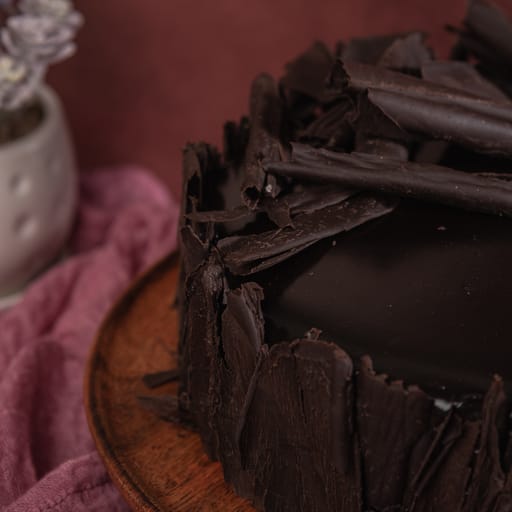 Chocolate cake decorated with chocolate flakes Stock Photo | Adobe Stock