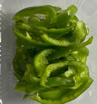 GREEN CAPSICUM SLCIED 200 GMS