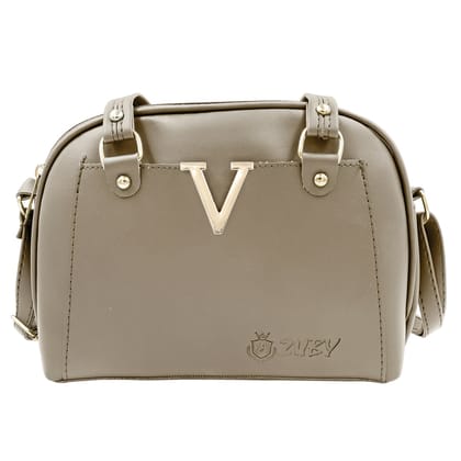 V chrome style Sling bag/Hand bag/Purse,V design in golden chrome in front  with adjustable long strap Comes in PU-Leather material Chiku