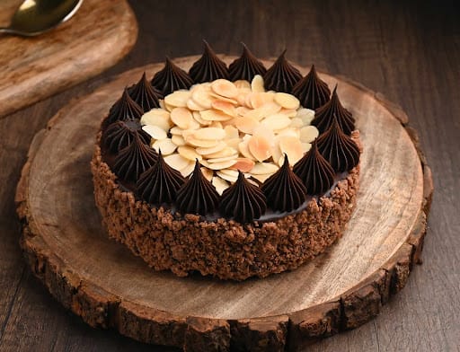 Bake My Day - Happy New Year beautiful people! Our new flavour Chocolate Almond  Praline Cake has become quite the hit with everyone! Moist chocolate cake  with a silky smooth chocolate frosting,