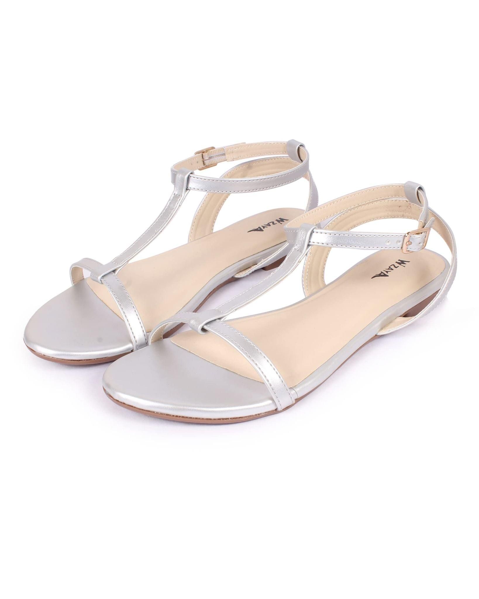 Cecile flat sandals in silver leather with straps and stones