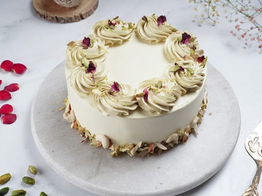 Celebrate Holi With This Floral, Softly Spiced Thandai Poke Cake |  Epicurious