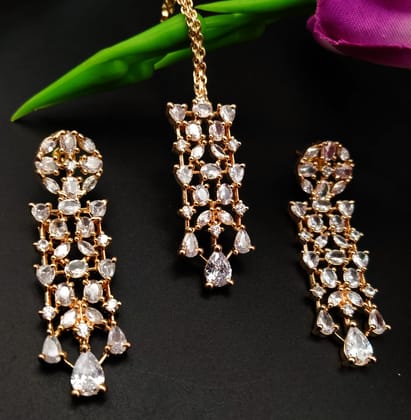 Party wear rose gold jewellery with earings & mangtika