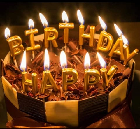 Happy birthday cake with candles. Stock Photo | Adobe Stock