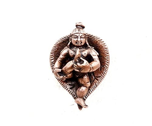 Copper Bala Krishna Lying in Banyan Leaf  2.3 inches