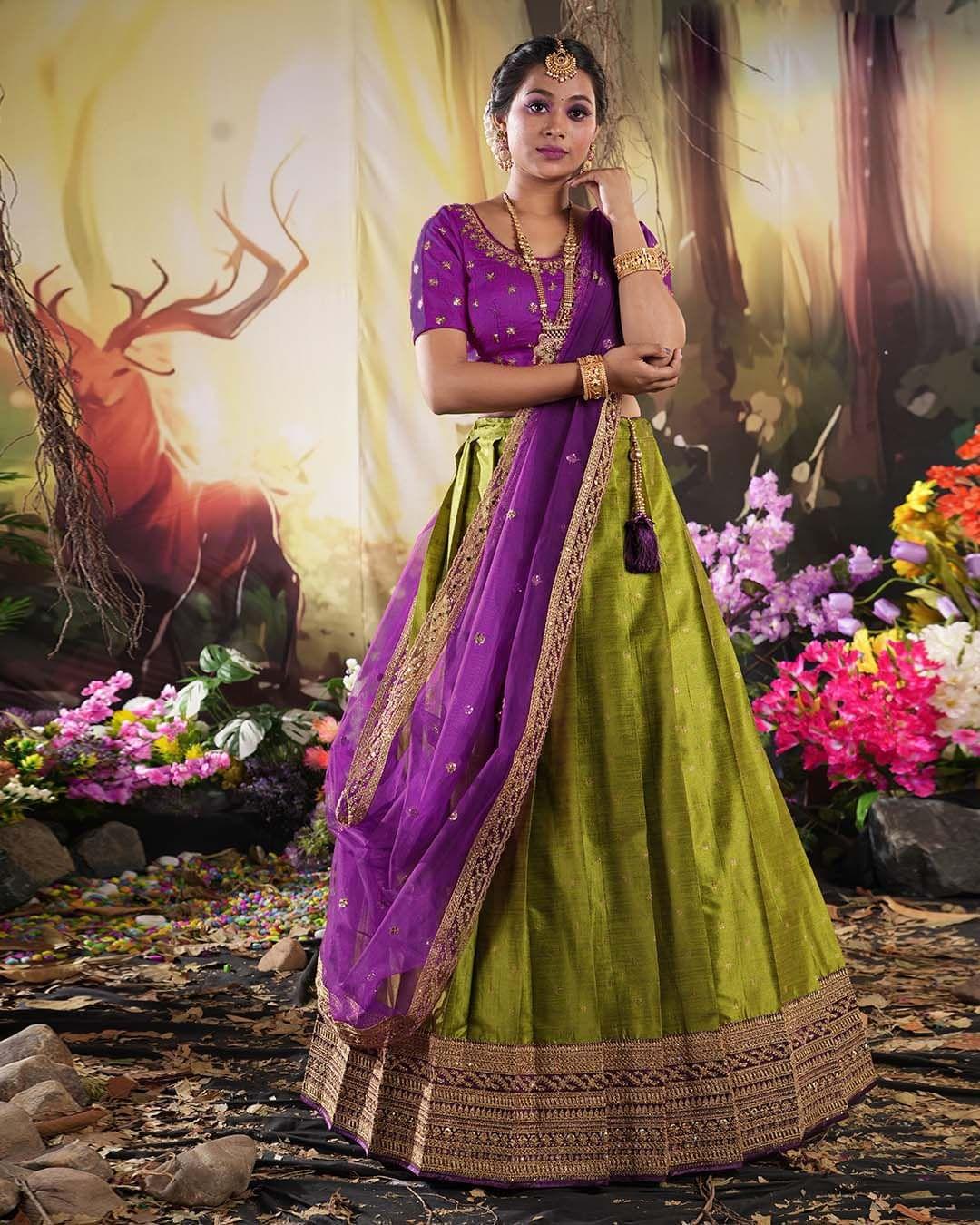 Purple net lehenga with red choli and green dupatta. | Lehenga blouse  designs, Lehenga blouse, Blouse designs