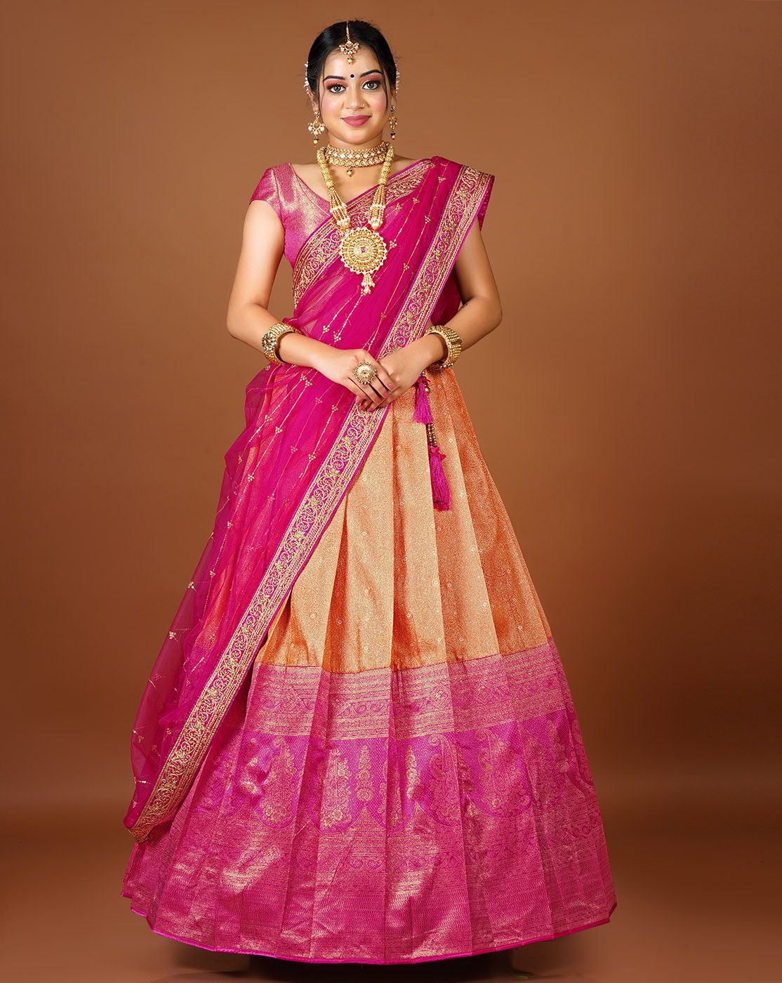 Orange And Rani Latest Kanjivaram Silk Lehenga With Zari Woven