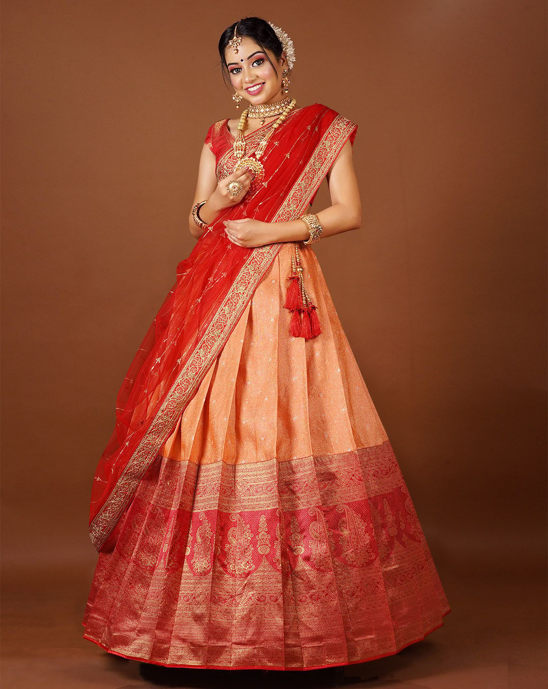 Orange And Red Latest Kanjivaram Silk Lehenga With Zari Woven