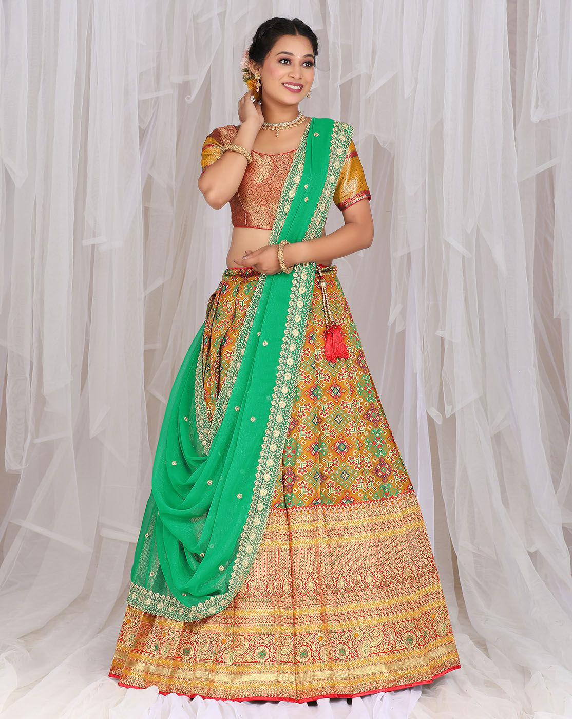 Musterd And Green Banarasi Jacquard Lehenga With Patola Print