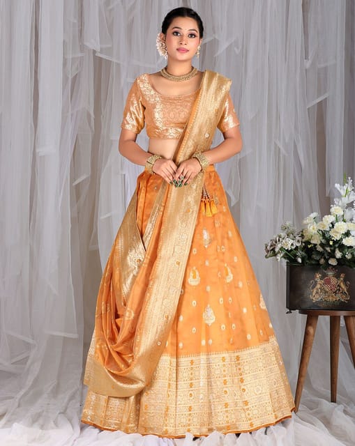 NITIKA GUJRAL' presents Gold Tissue Lehenga Choli And Belt With Cotrasting  Red Tulle Dupatta And Optional Gold Tissue Second Dupatta available  exclusively at FEI