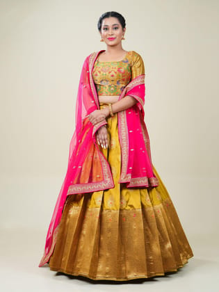 Musterd Rani Banarasi Silk Semi-Stitched Lehenga With Unstitched Blouse And Dupatta.