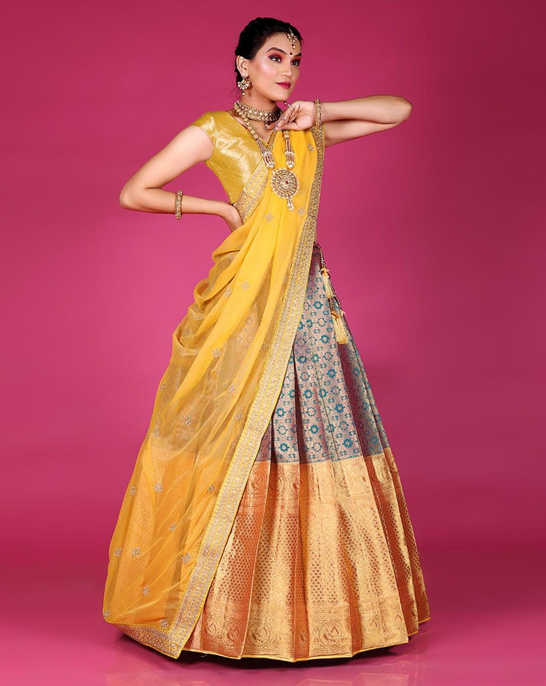 Rama And Yellow Is A Banarasi Silk Zari Work Half Saree For Women.