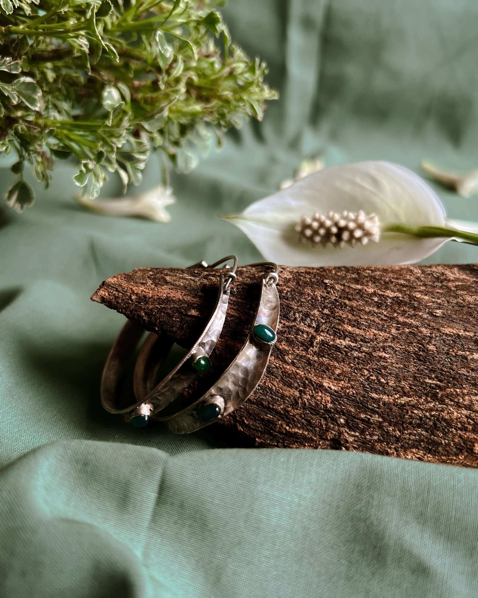 Seher oxidised silver hoops with emerald stones