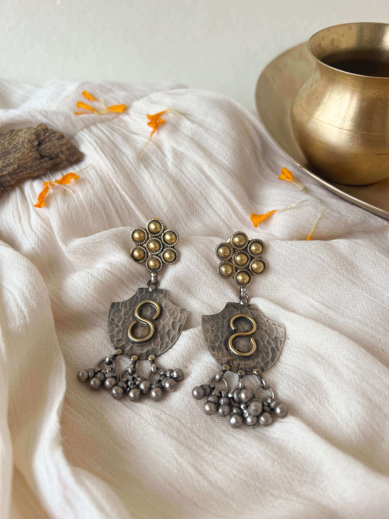 Raksha dual tone earrings with ghunghroo detail