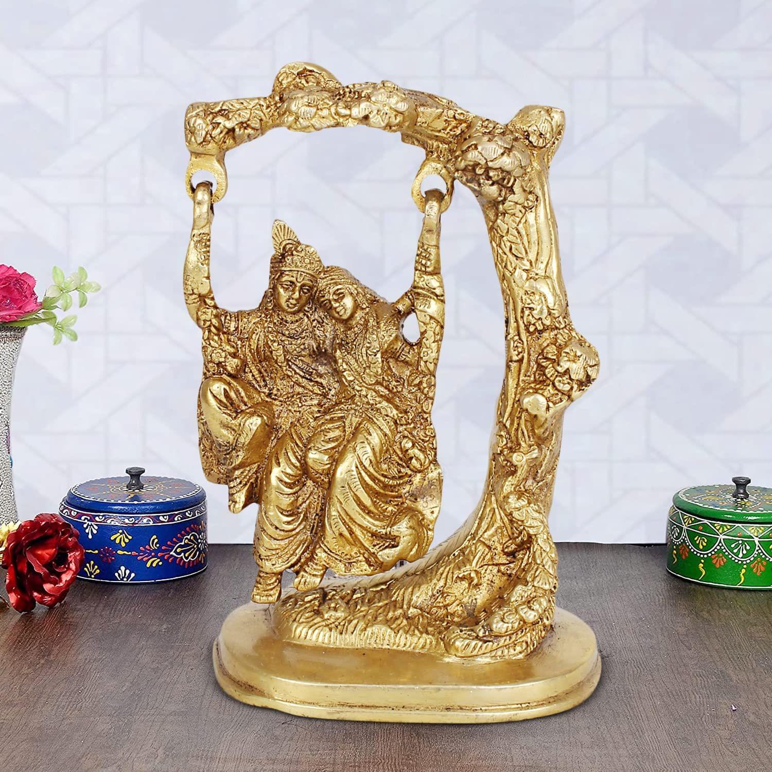 ARTVARKO Brass Gold Murti Radha Krishna Couple Idol Statue Swinging Jhula Under Tree for Home Decor Living Room Pooja Mandir Gift Item Height 6.5 Inch