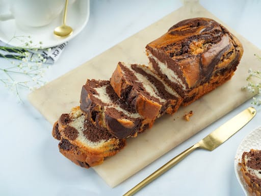 This chocolate marble cake is moist and buttery. It is a perfect tea cake  and I bet you can't stop with just one slice. #marblecake #snack… |  Instagram