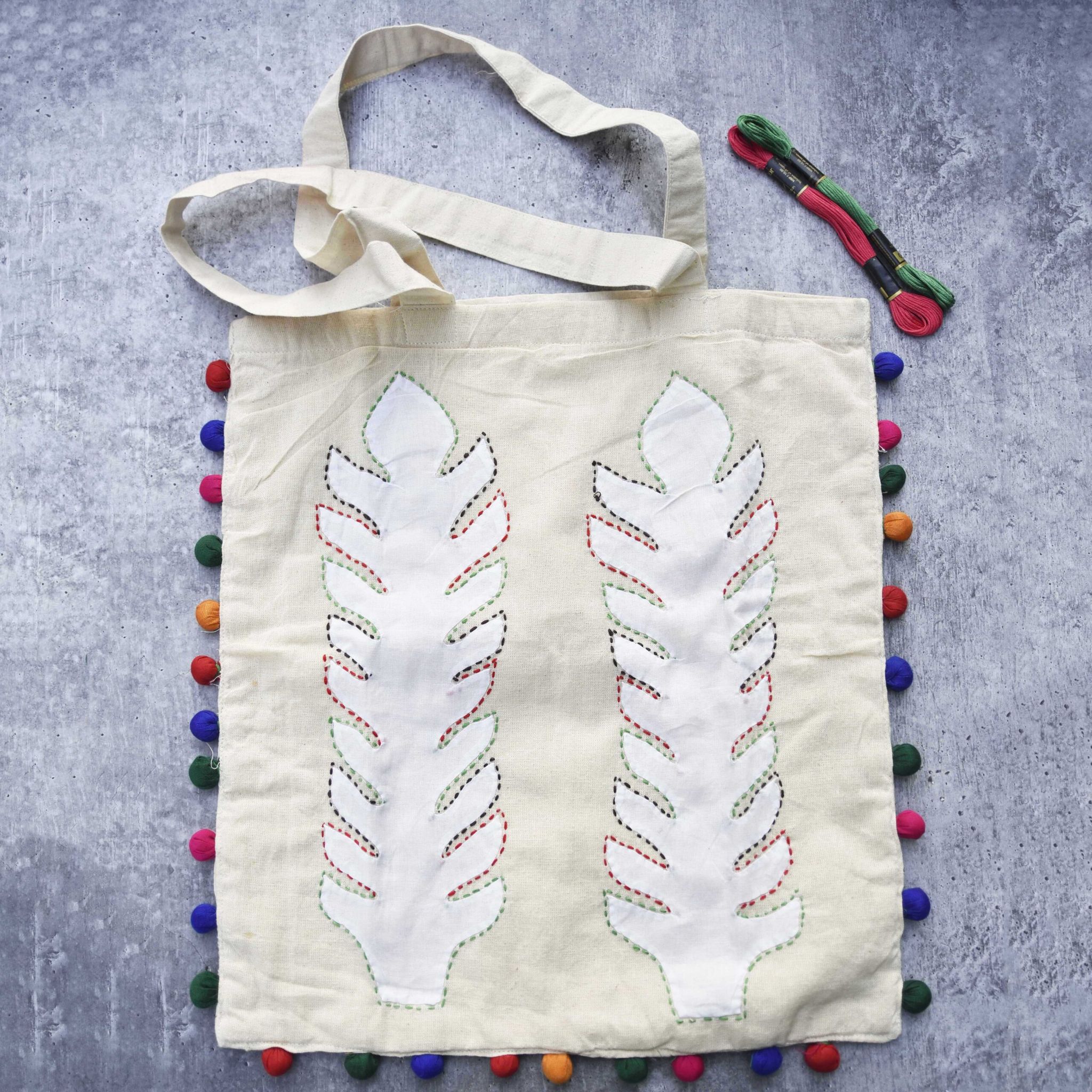 COLOURED POTLI & APPLIQUE WORK WHITE TOTE BAG