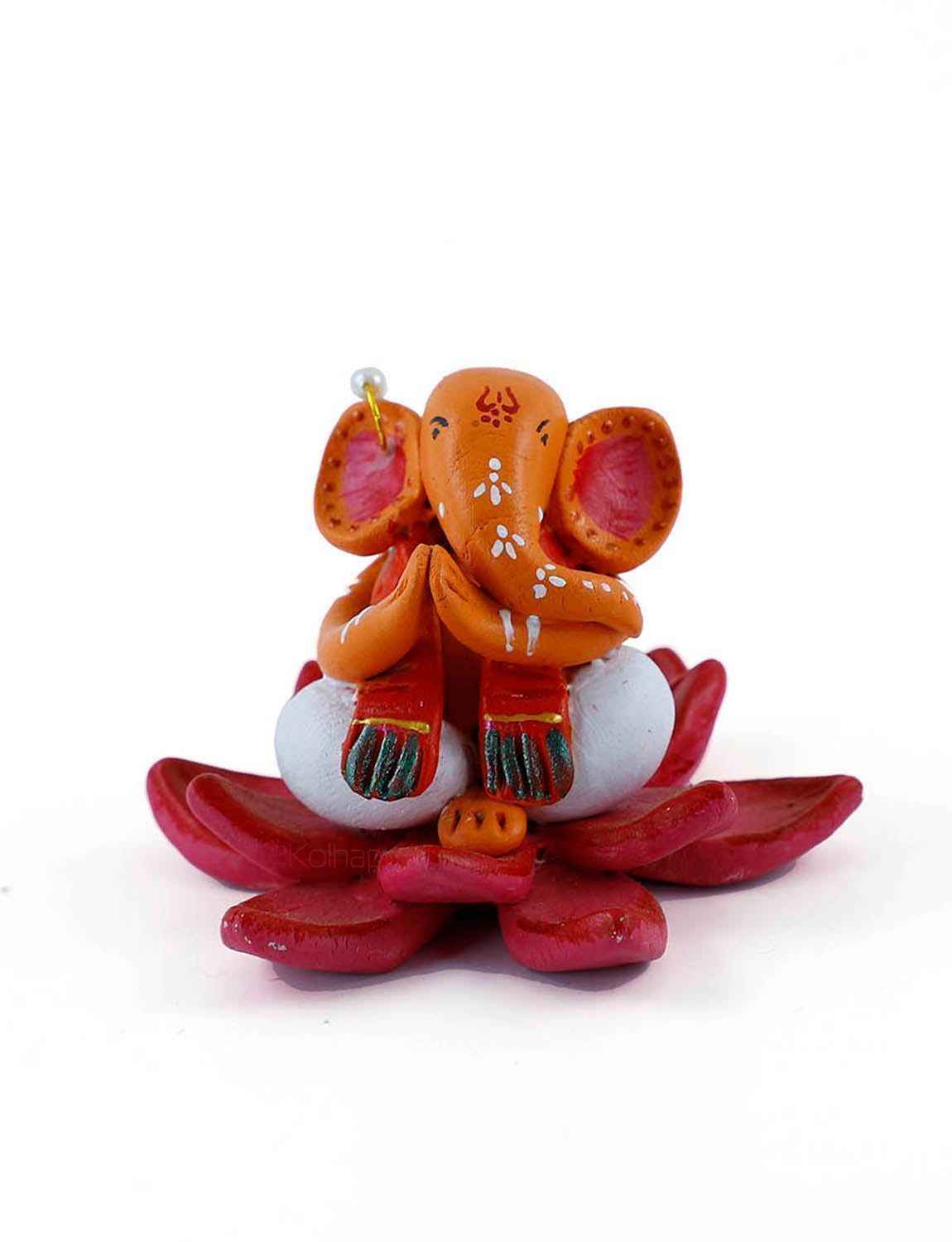 Multicoloured Ganpati Idol on Lotus.