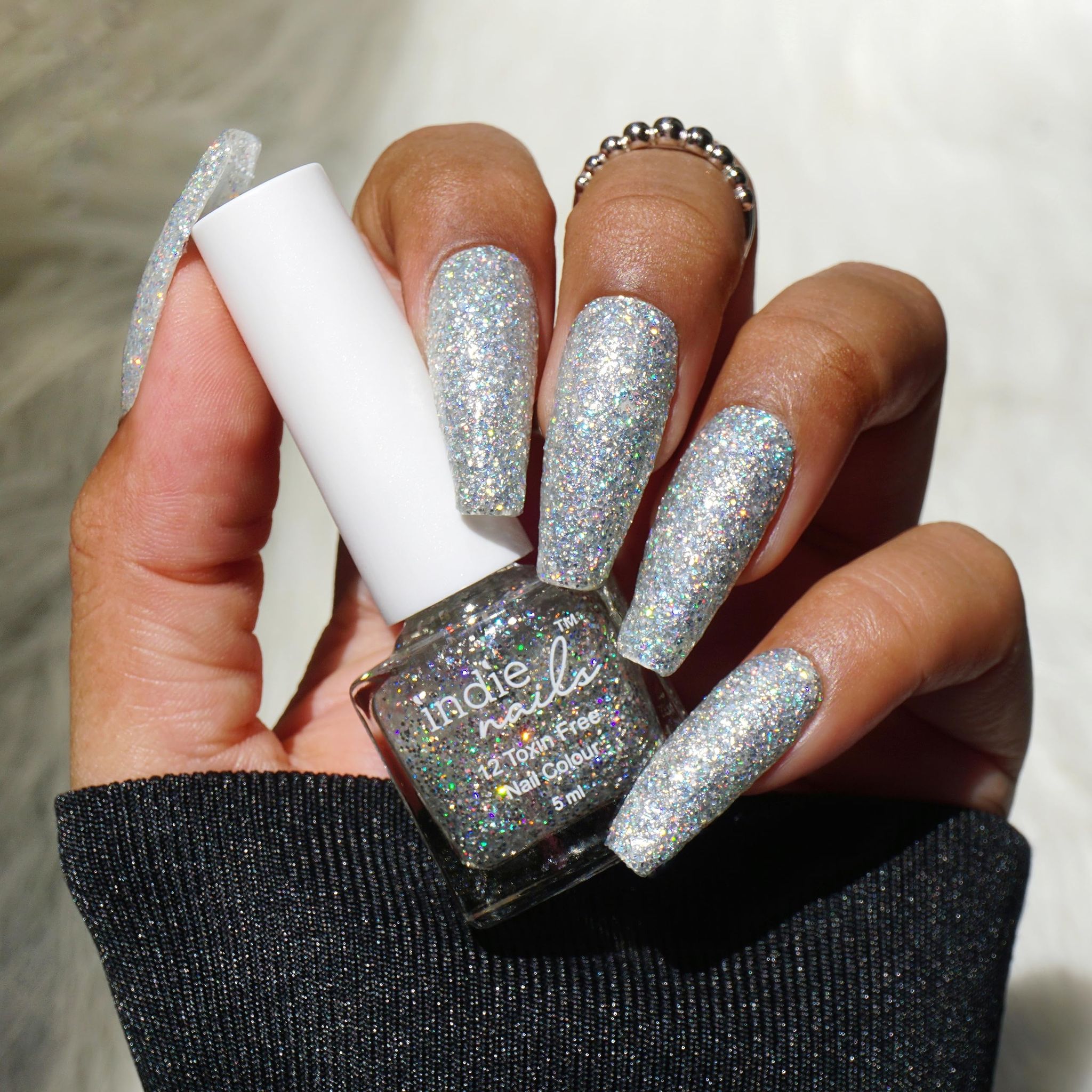 Indie Nails Disco Night is Free of 12 toxins vegan cruelty-free quick dry glossy finish chip resistant. Silver Holo Glitter Nail polish, enamel, lacquer, paint Liquid: 5 ml