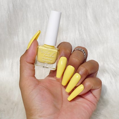 Indie Nails Mango Lassi is Free of 12 toxins vegan cruelty-free quick dry glossy finish chip resistant. Yellow Colour shade Nail polish, enamel, lacquer, paint Liquid: 5 ml