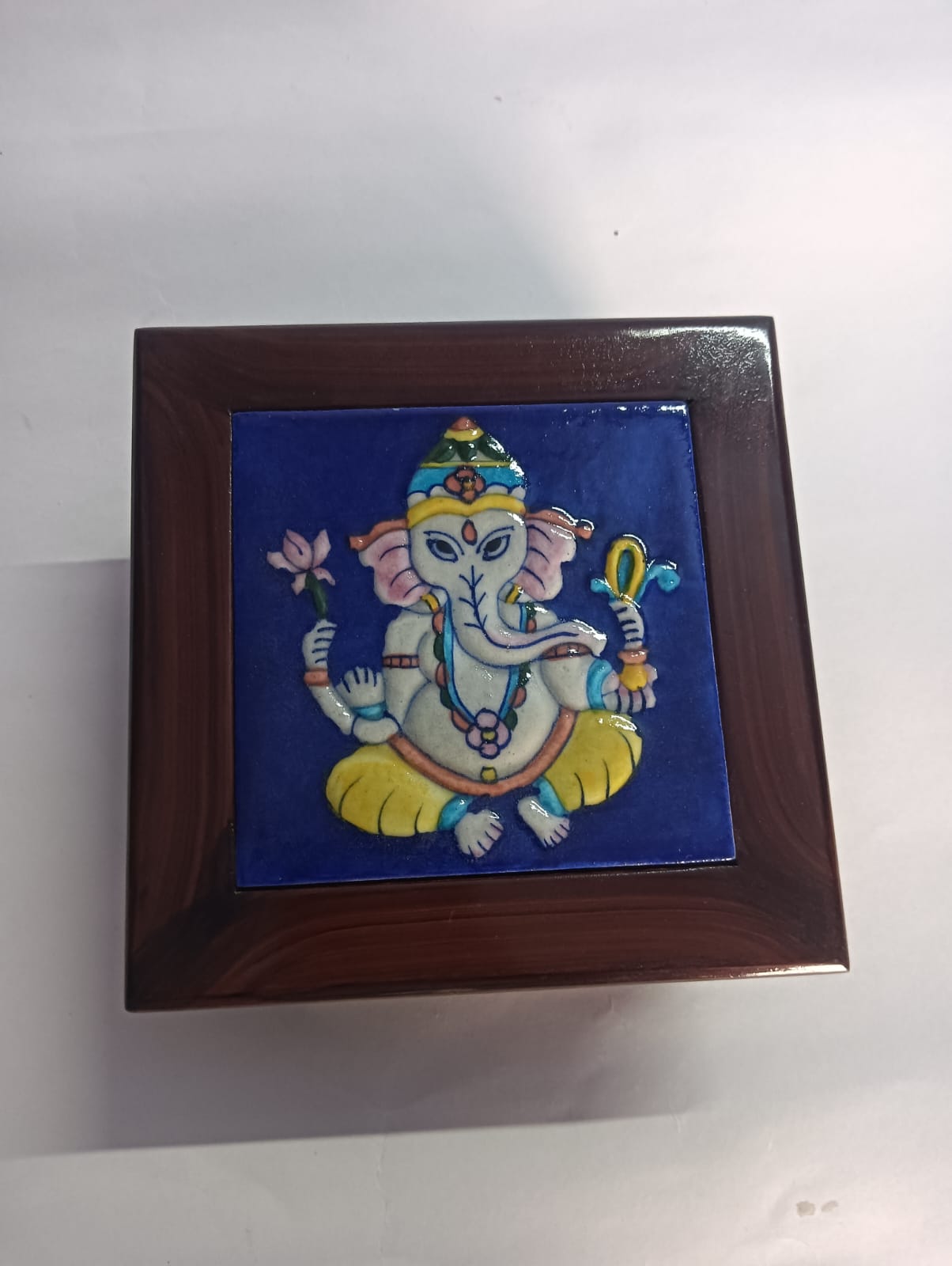 Ganesh Wooden With Blue Pottery