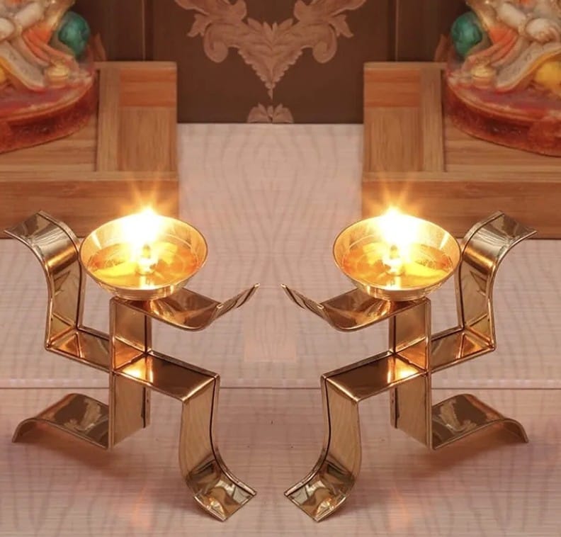 Metal  rass Gold polish Swastik Diya set of 2