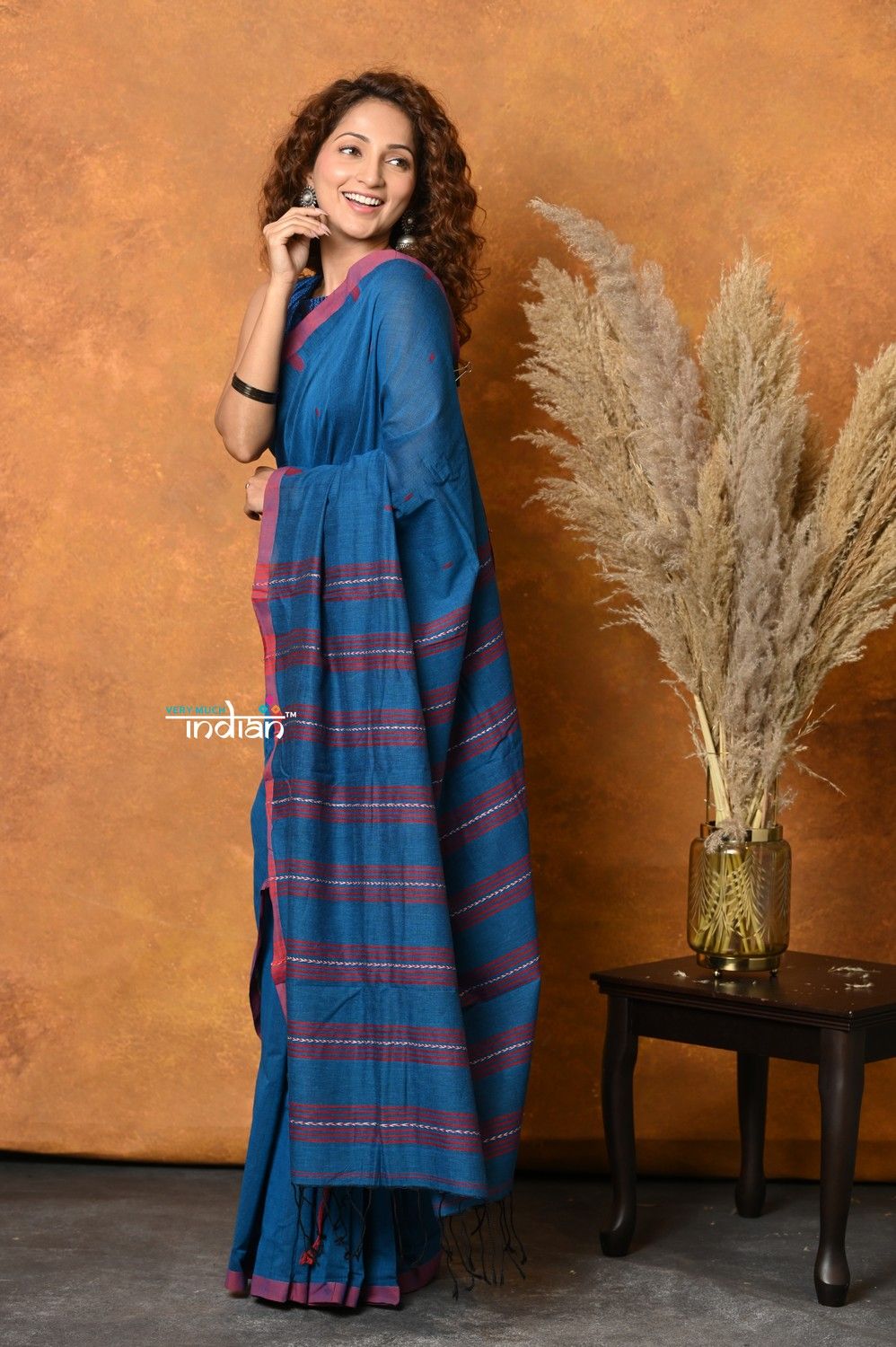 Pure Cotton Handloom Saree with Buttis & Sleek Border