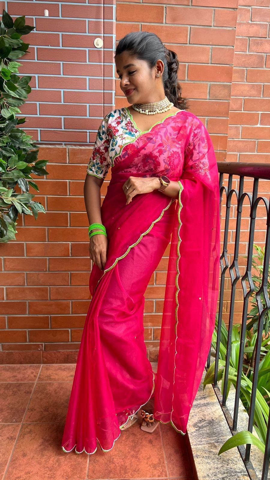 Fuchsia pink organza saree with handwork blouse