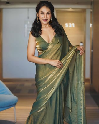 Golden Pastel Green Fendy Silk wedding and partywear Saree