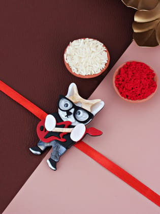 Lucky Jewellery Trendy Fashion Plastic Guitar Cat With Glasses Kids Rakhi - Rakshabandhan Rakhee Bracelet for Kids Brother Bhaiya Bhai Bhabhi - Pack of 1 (440-CHR1-1192-1)