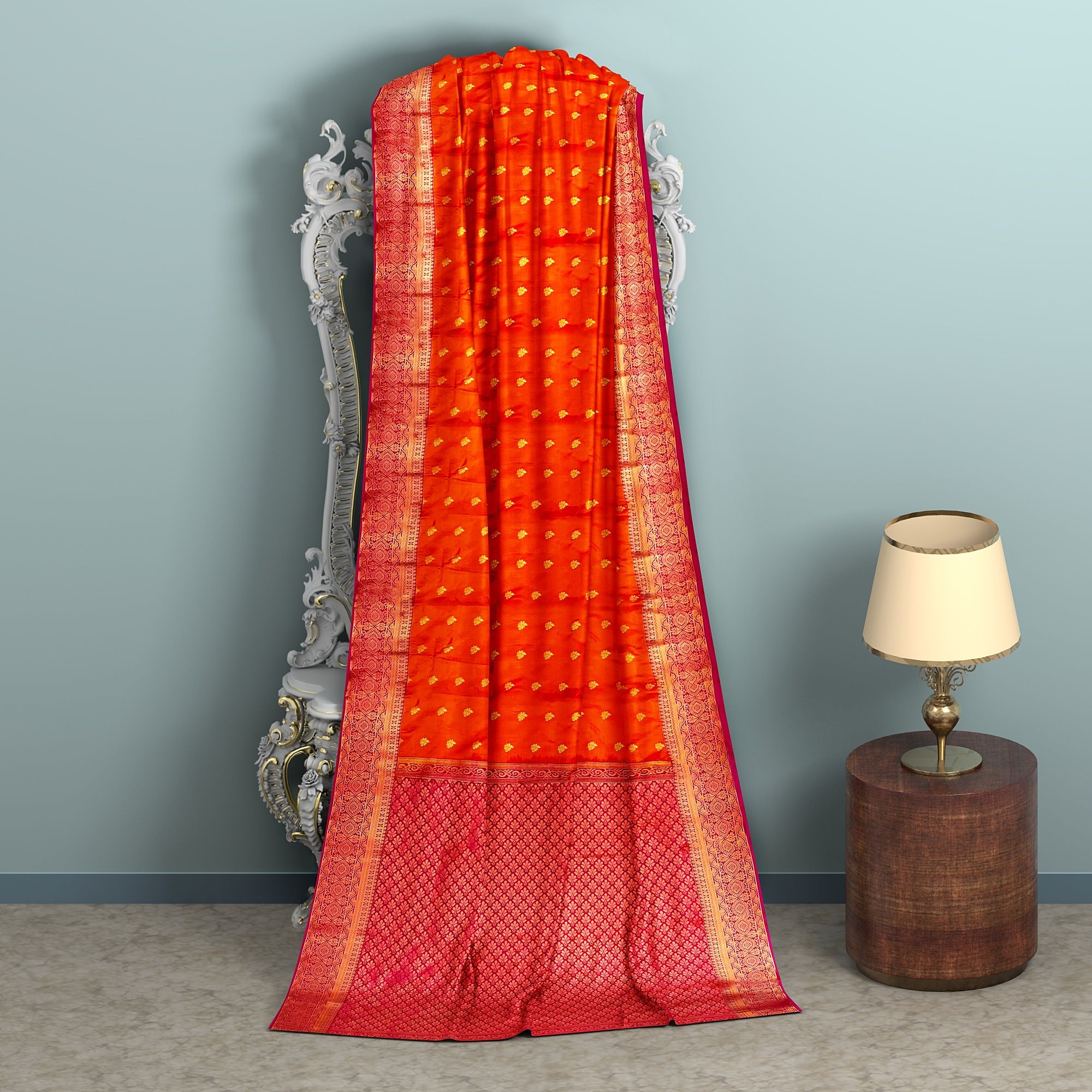 Orange body with red border1000 buttas semi silk saree