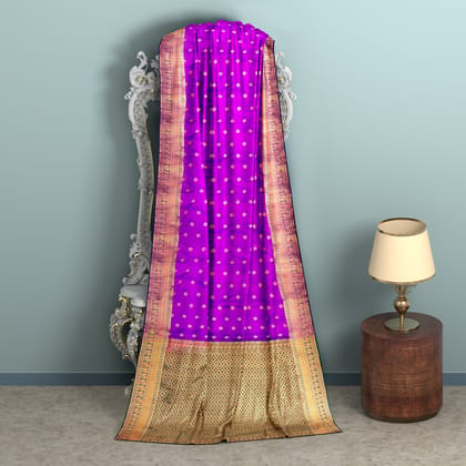 purple body with zari worked border 1000 buttas saree.