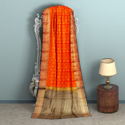 Permissson orange with zari worked border 1000 buttas semi silk saree