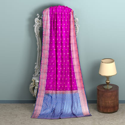 Magenta body with zari worked blue border 1000 buttas semi silk saree