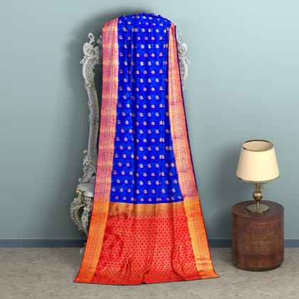 Blue body with zari worked red border 1000 buttas semi silk saree