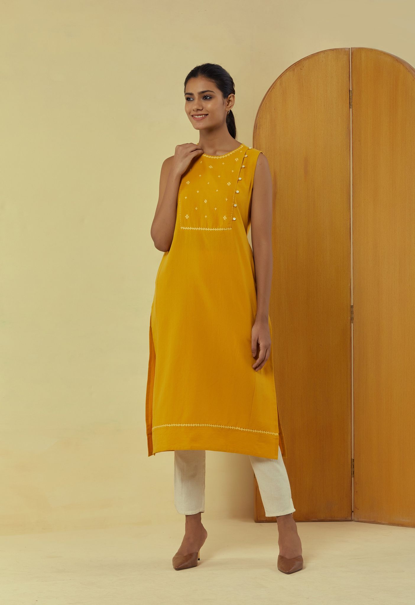 Liana Turmeric Sleeveless Kurta with Hand Embroidery