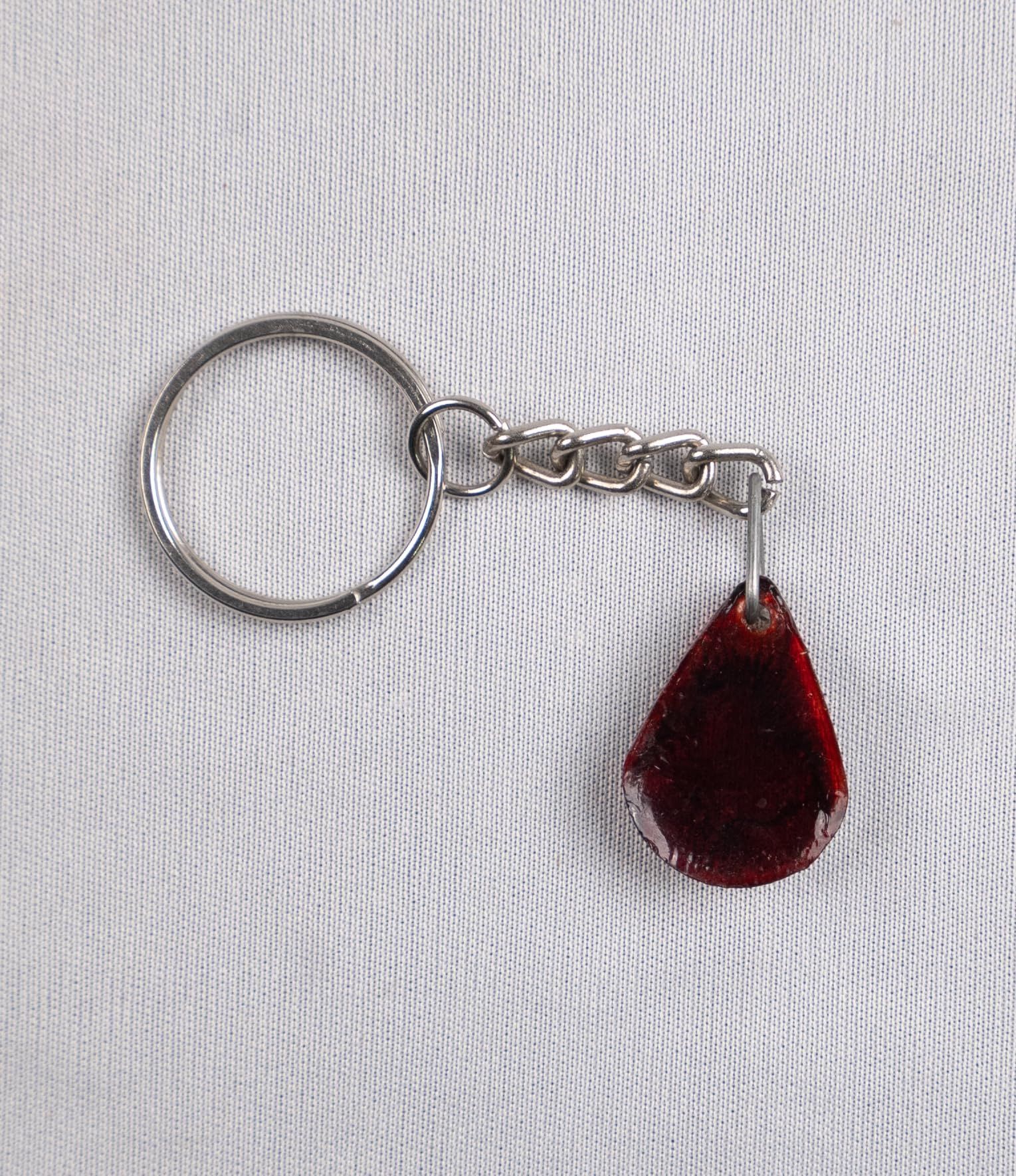 SONCHIRAIYA DIAMOND SHAPE RESLING KEY CHAIN