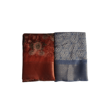  A Set of Two Beautiful Sarees: One in a Deep Red Floral Print and the Other in Blue with Geometric Motifs