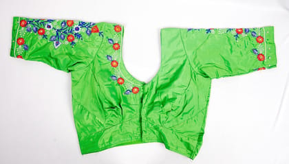 Green blouse with floral embroidery