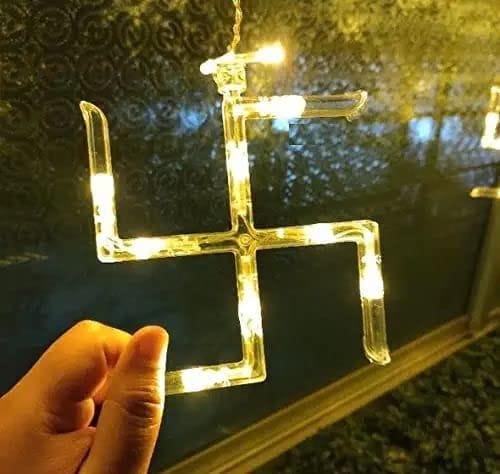 Plastic Warm White Swastik Curtain Light, String Lights With Pack Of 12 Hanging Swastik And Om 8 Flashing Modes For Diwali Decoration, 5 Centimeters, LED