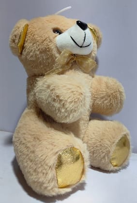  Cute and cuddly beige teddy bear with golden accents