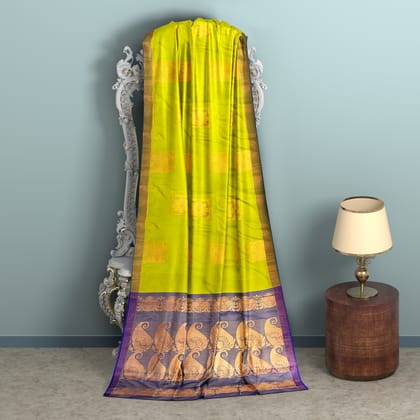 lemon green and (l) Blue Kanjivaram Silk Saree With Peacock Motifs