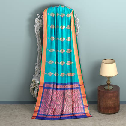  Sky Blue Kanchipuram Silk Saree With Floral Butta And Contrast Border