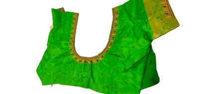 Green blouse with intricate embroidery