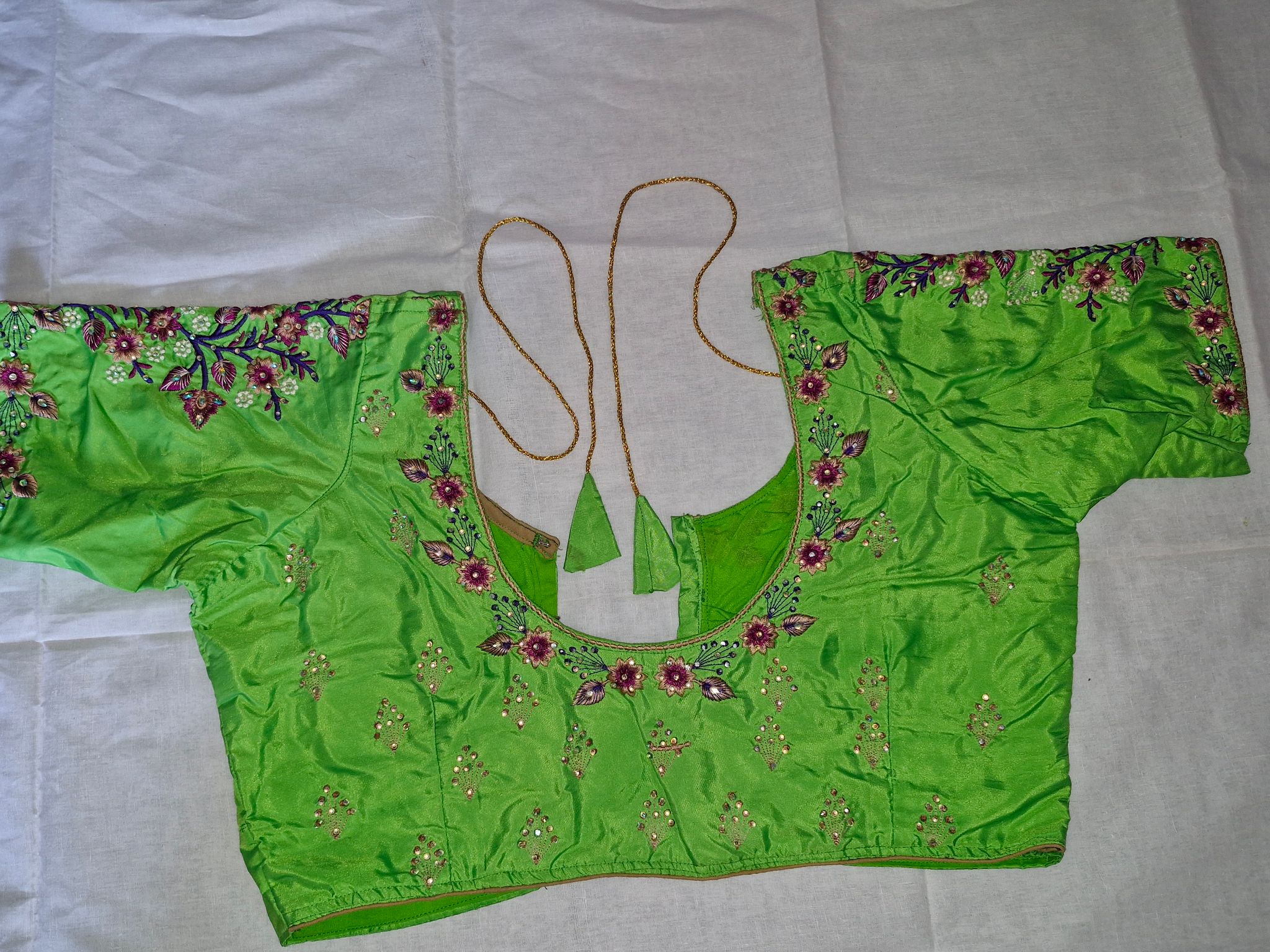  Green blouse with floral embroidery