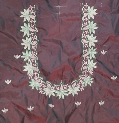  Embroidered boat neck blouse with floral motifs