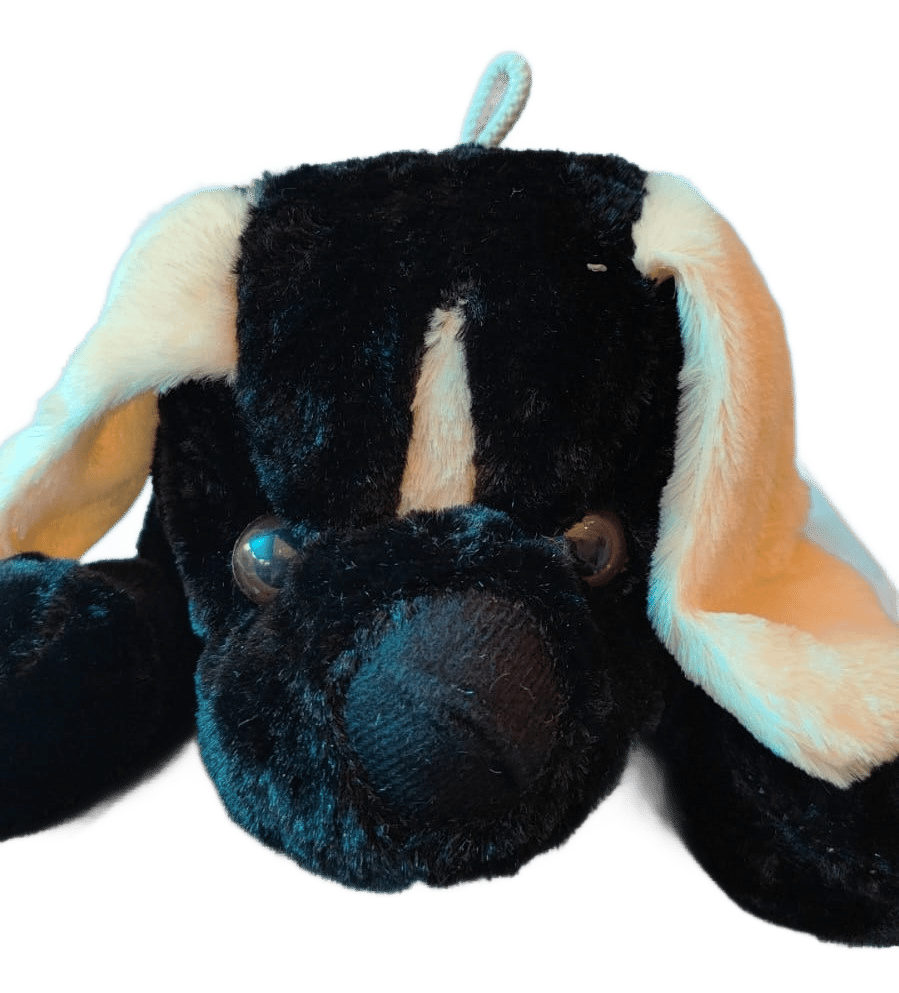 Cute and cuddly black and white puppy plush toy