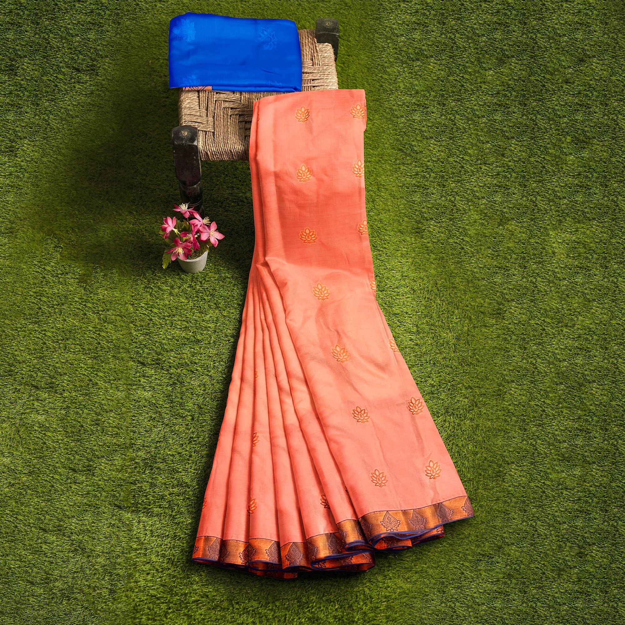 Peach with blue colored Pure soft silk Kanjivaram Silk Saree With Floral Butta Design