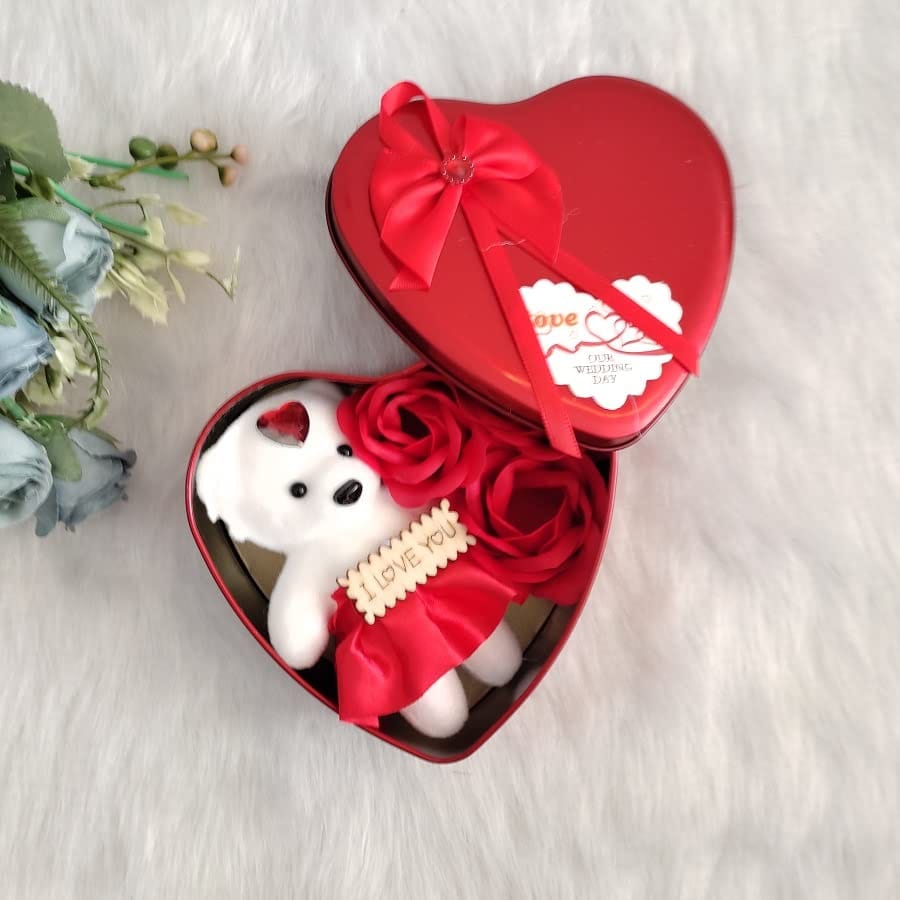  Red heart-shaped box with a teddy bear and roses