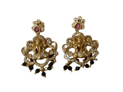 "Stunning antique gold plated Goddess Lakshmi earrings with intricate detailing and black beads."